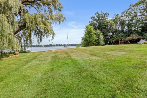 Enjoy effortless indoor-outdoor living surrounded by mature trees and exceptional privacy. This one-of-a-kind property on sought-after Turtle Lake provides for maximum privacy and year-round fun.