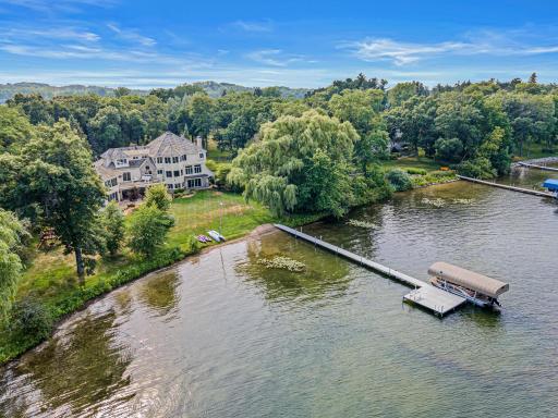 Thoughtfully refreshed from top to bottom, the home showcases fresh interior and exterior paint, beautifully refinished hardwood floors, luxurious new cut-and-loop carpeting, updated designer lighting, and numerous quality improvements.