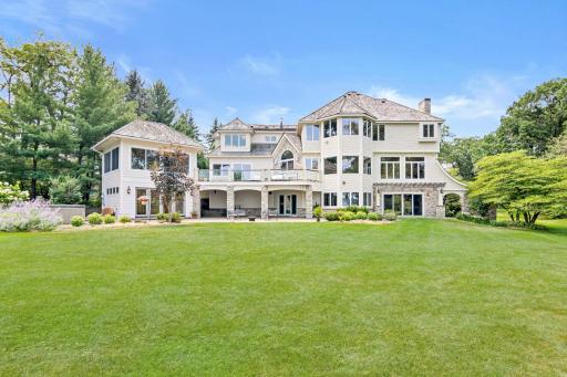An aerial perspective captures the rare combination of privacy, pristine waterfront, and beautifully manicured grounds.