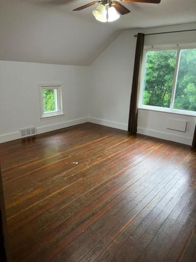 One of the 3 upper level bedrooms with hardwood floor