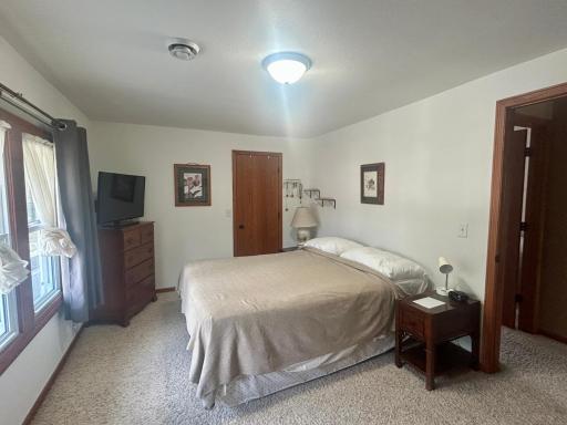 Upstairs primary bedroom with walk in closet & additional closet