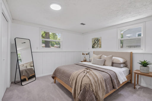 Lower level: bedroom 3 (virtually staged)