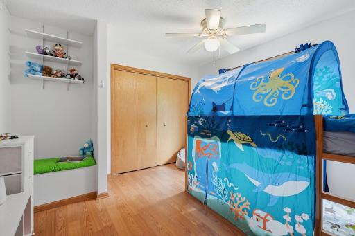 3rd bedroom upstairs includes built-in bench for an adorable reading nook.