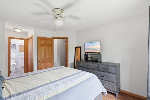 Primary bedroom connects to walk-through full bath.