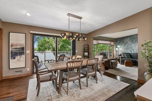Formal dining open from the living room with access to to the deck.