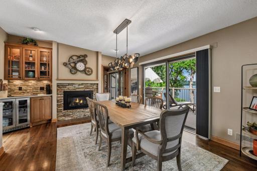 Formal dining has vaulted ceiling & sliding door to deck.