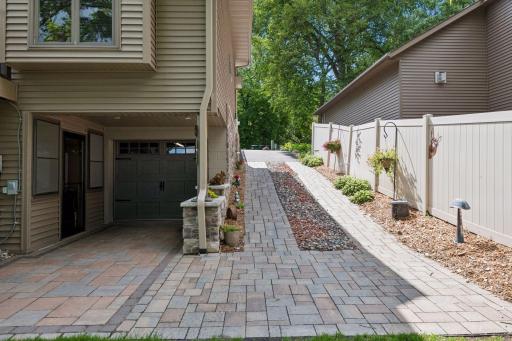Stone walkway from the front to the rear yard.