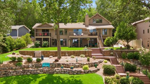 Professionally landscaped terraced yard to the lake.