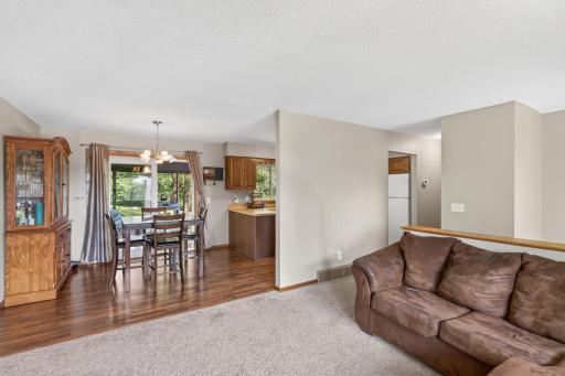 Floorplan allows for easy flow from living room to the dining area and kitchen, as well as the three-season porch and backyard.