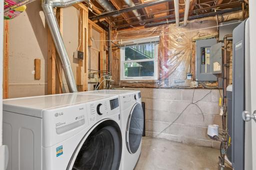 Front-loading, full sized washer and dryer in the lower level, as well.