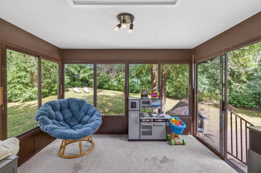 Three-season porch is a great bonus space for enjoying beautiful Minnesota summer days!