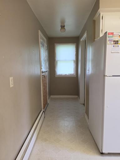 Hall from kitchen to rear porch and laundry room