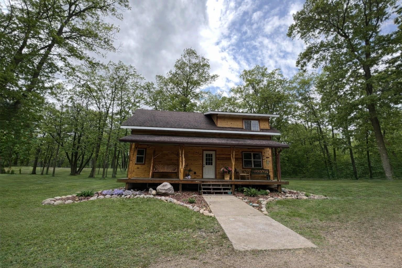 Front covered porch. Picture has been digitally altered to removed personal belongings.