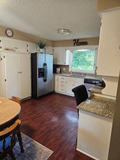 Kitchen with Eat in Area & Granite Countertops