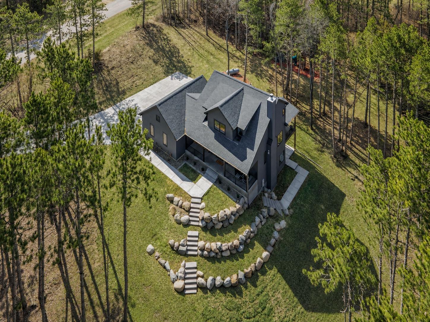 Custom built River Falls home on over 4 private acres