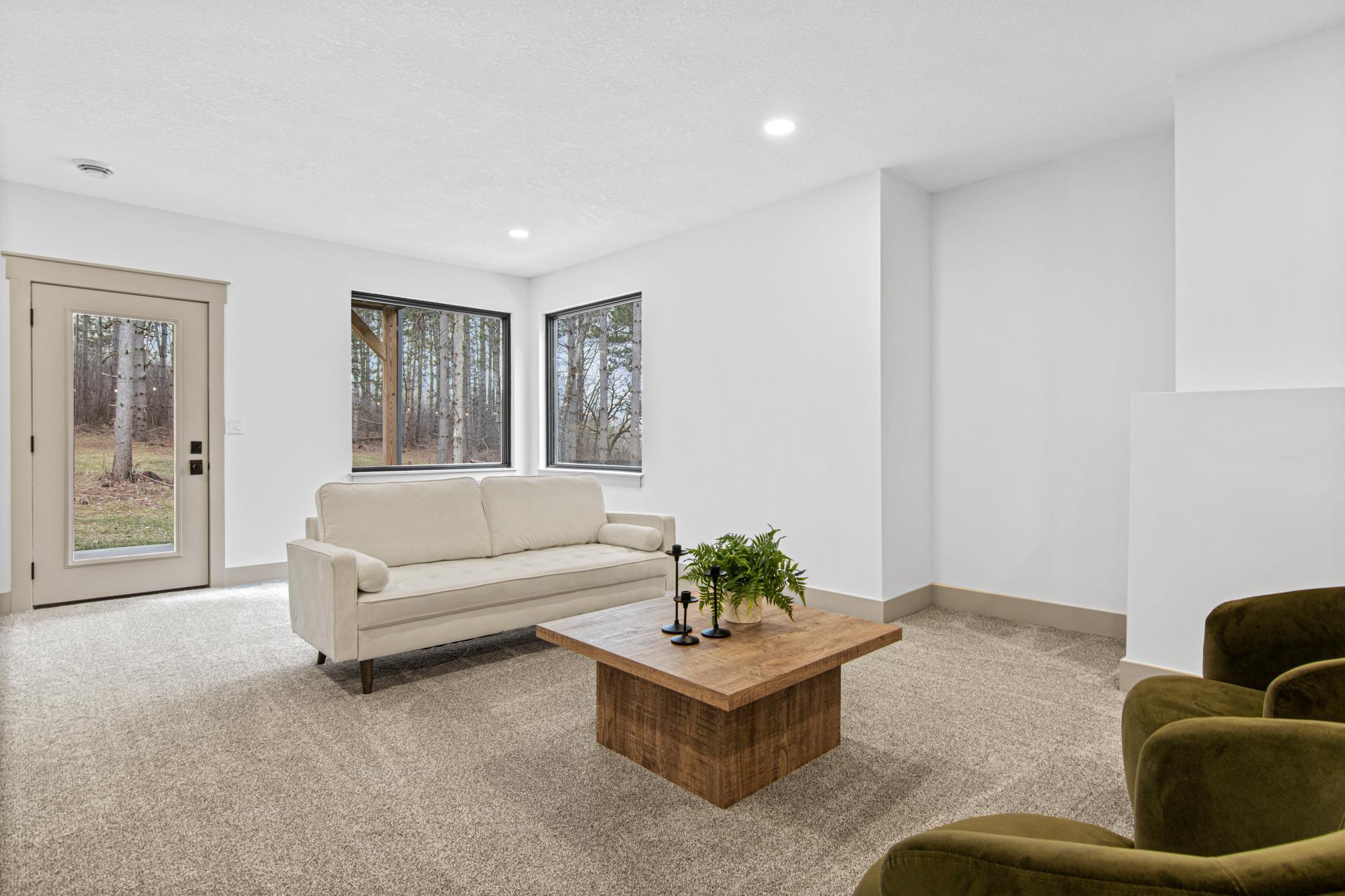 Walkout access creates an easy connection to the backyard and surrounding acreage.