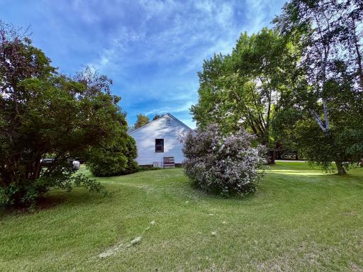 North side of home with lilac bush