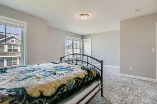 7582 38th St N - Web Quality - 018 - 17 2nd Floor Primary Bedroom.jpg