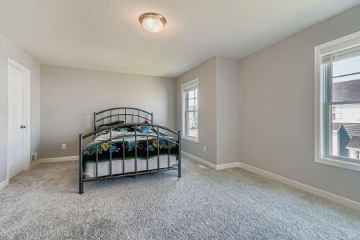 7582 38th St N - Web Quality - 019 - 18 2nd Floor Primary Bedroom.jpg