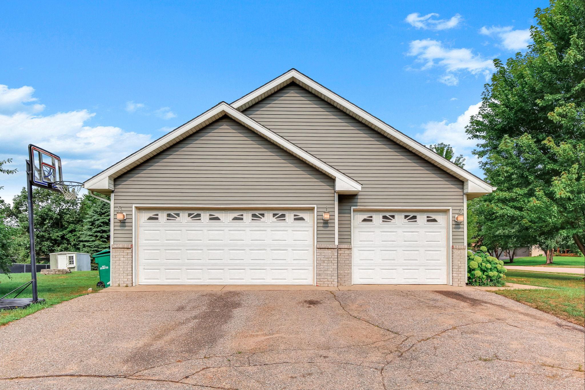 3-car garage provides space for: Parking up to three vehicles or Lawn and garden equipment, boat, ATV, snowmobile, or motorcycle storage. Also perfect for your workshop, Home gym area, Hobby or crafting space.
