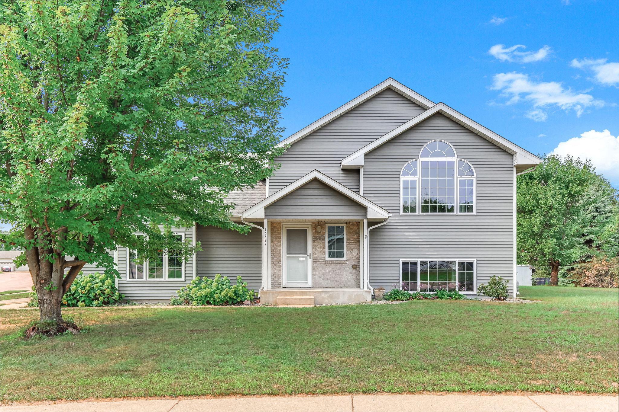 Welcome home to this spacious split-level featuring vaulted ceilings, abundant natural light, and a inviting open-concept layout. There are 4 spacious bedrooms perfect for family, guests or home office.