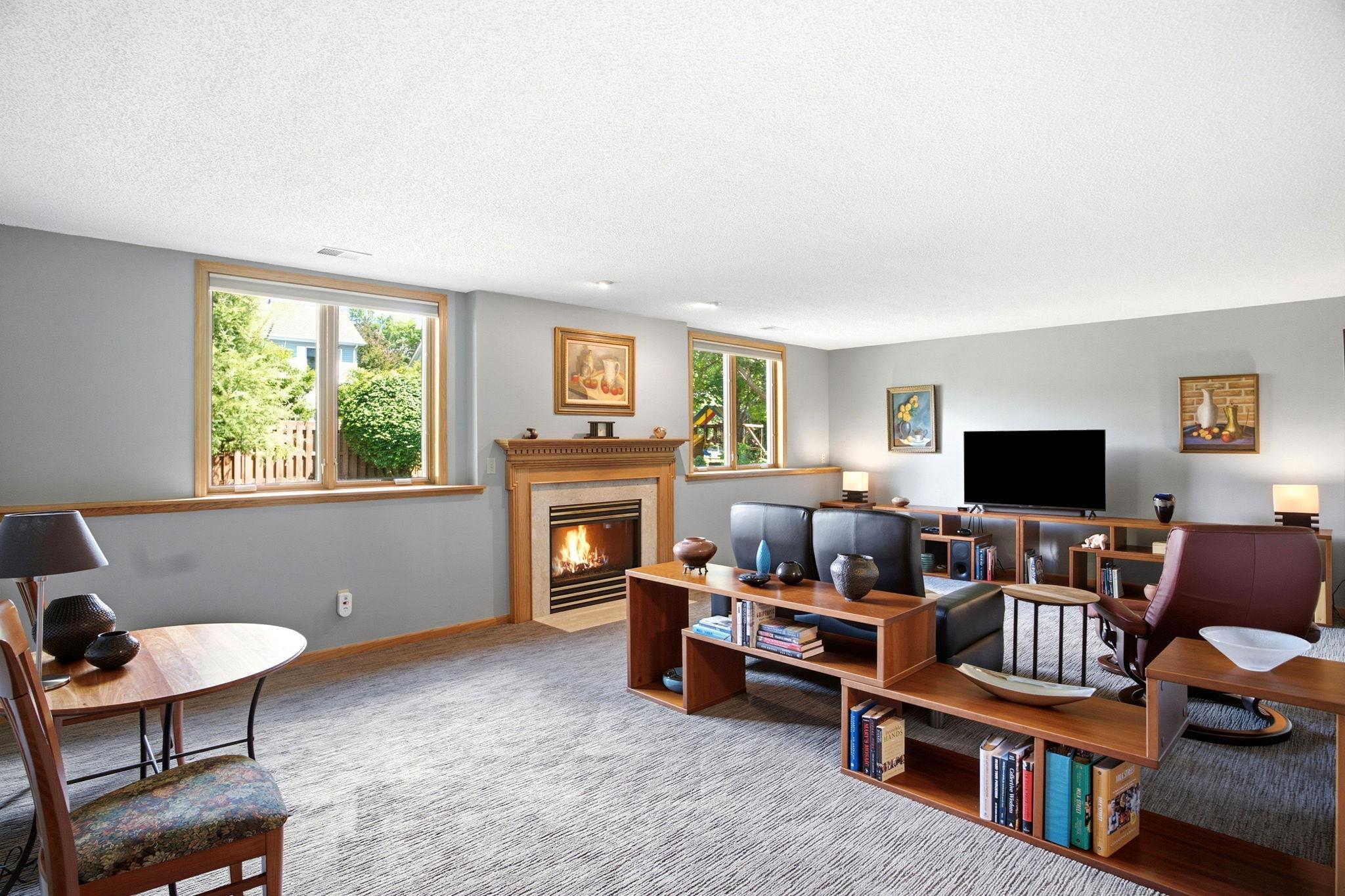 Lower level family room with a gas fireplace