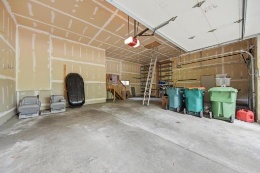 Unbelievable 3 car garage with walls of storage