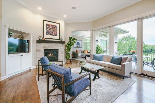 Anchored by a stone gas burning fireplace