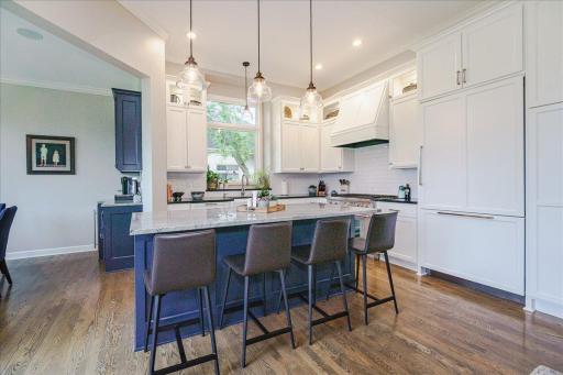 12 foot ceilings and hardwood floors anchor the space