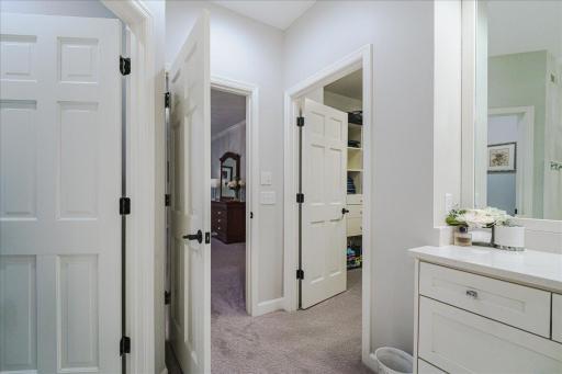 The ensuite is complete with custom walk-in closet and private water closet