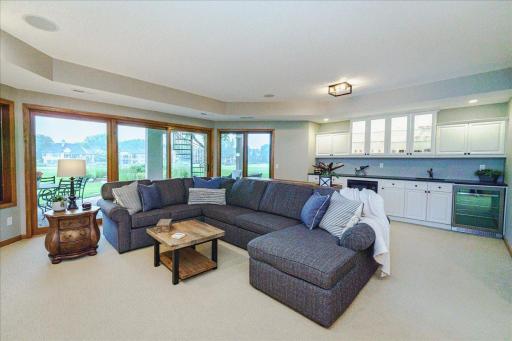 Patio doors and wall of windows providing more course views