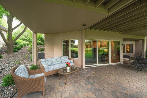 Enjoy course views from your shaded paver patio