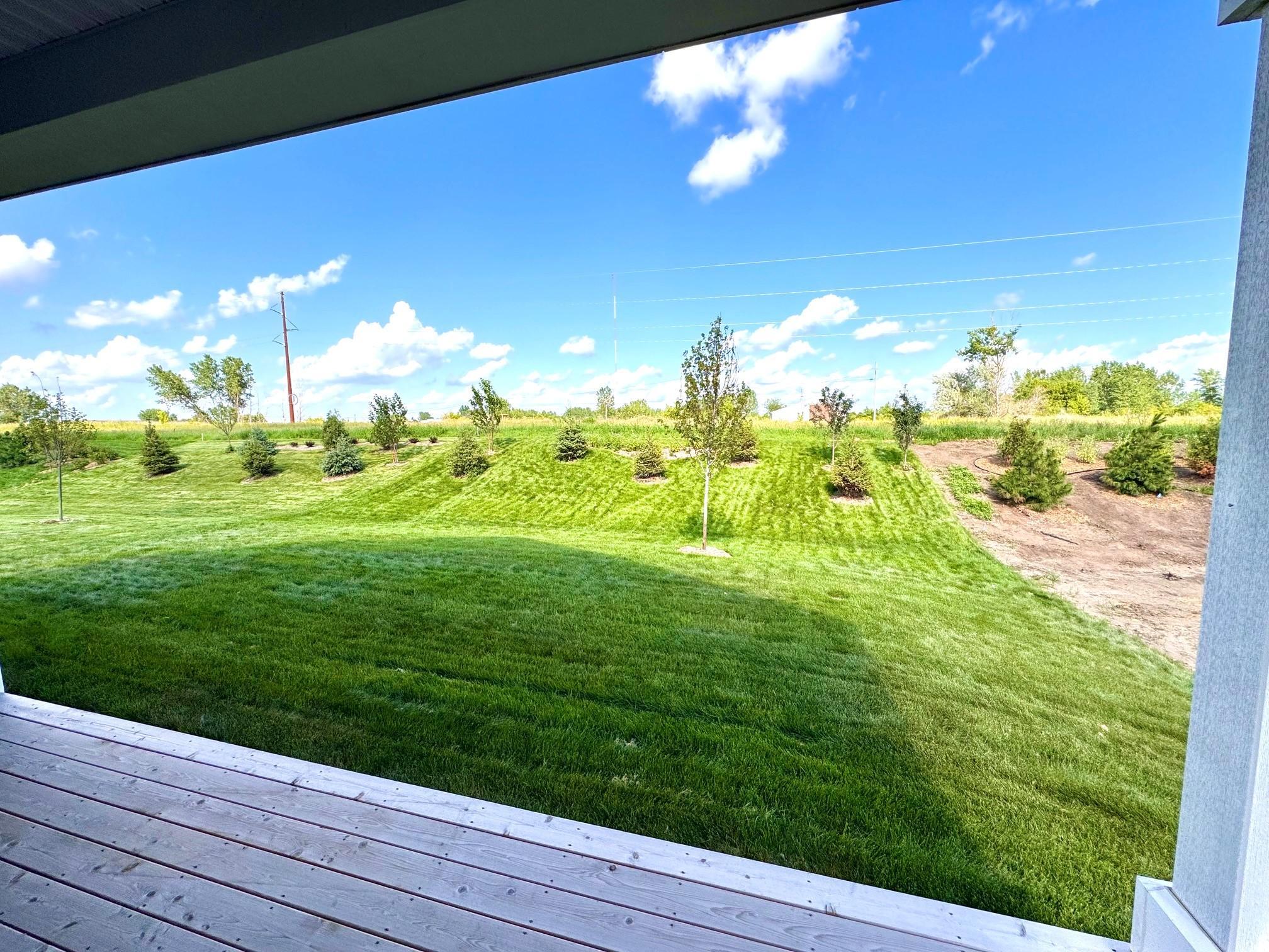 Privacy and views from your covered deck! Actual home.