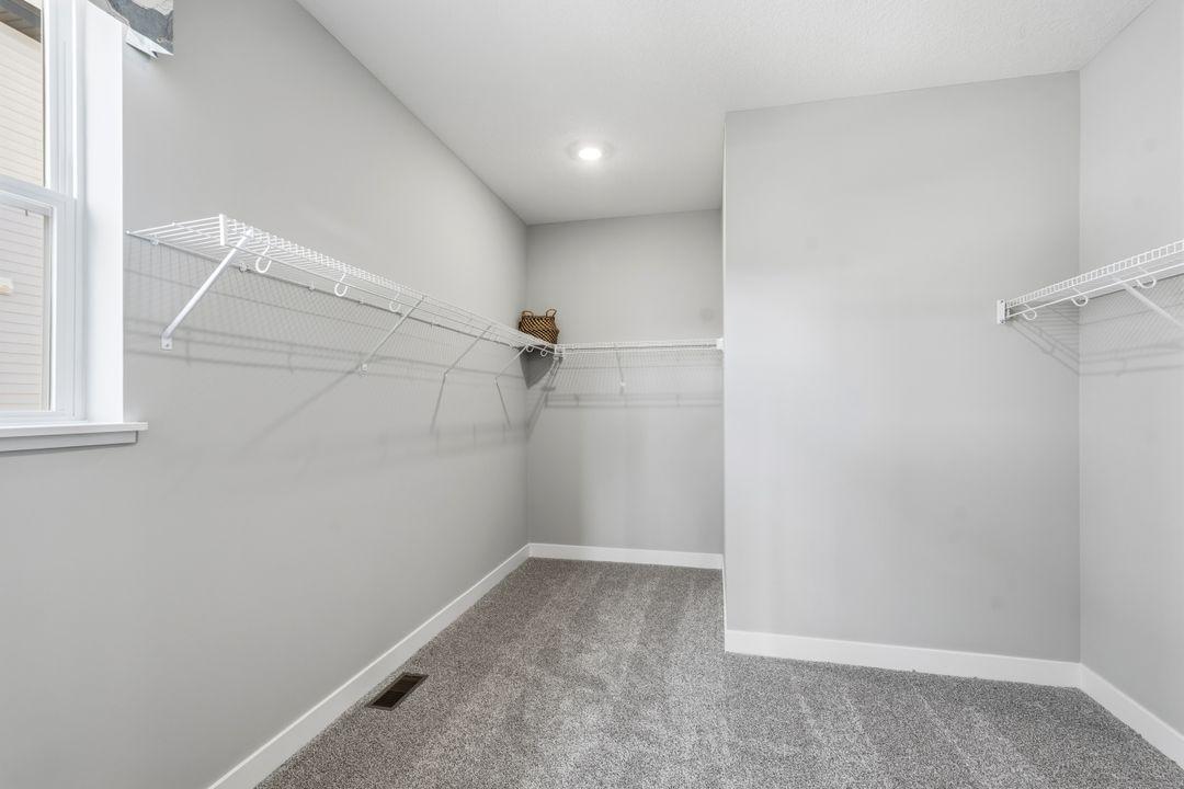 You won't have to worry about having enough closet space in this home! Model photo, options and colors may vary.