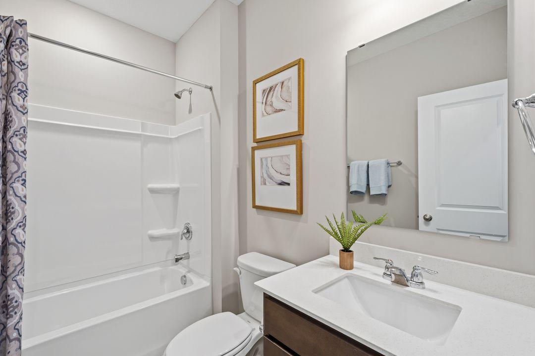 Second/guest bathroom. Model photo, options and colors may vary.