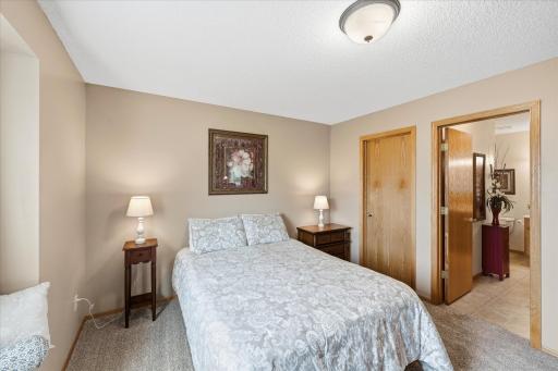 Convenient walk-through bath connected to the primary bedroom.