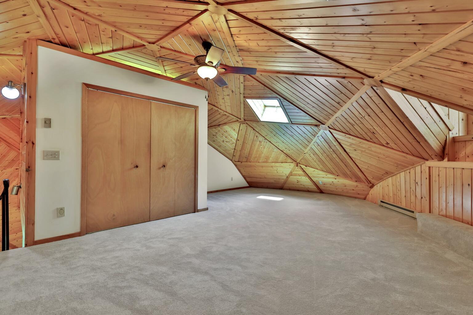 Third level bedroom with large closet.