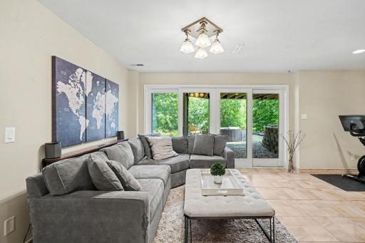 Family room with walkout to the backyard patio - Lower-level