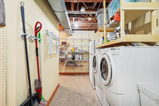 Utility room with laundry and storage: Lower-level