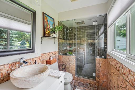 Bathroom within master bedroom: Upper level