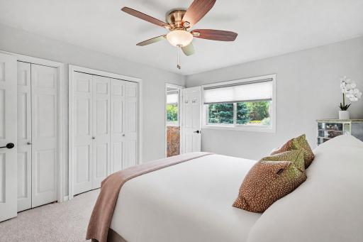 Master bedroom with a private 3/4 bathroom: Upper-level