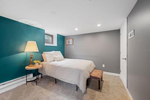 Lower level bedroom & 3/4 bath are ideal for guests or multi-generational living.
