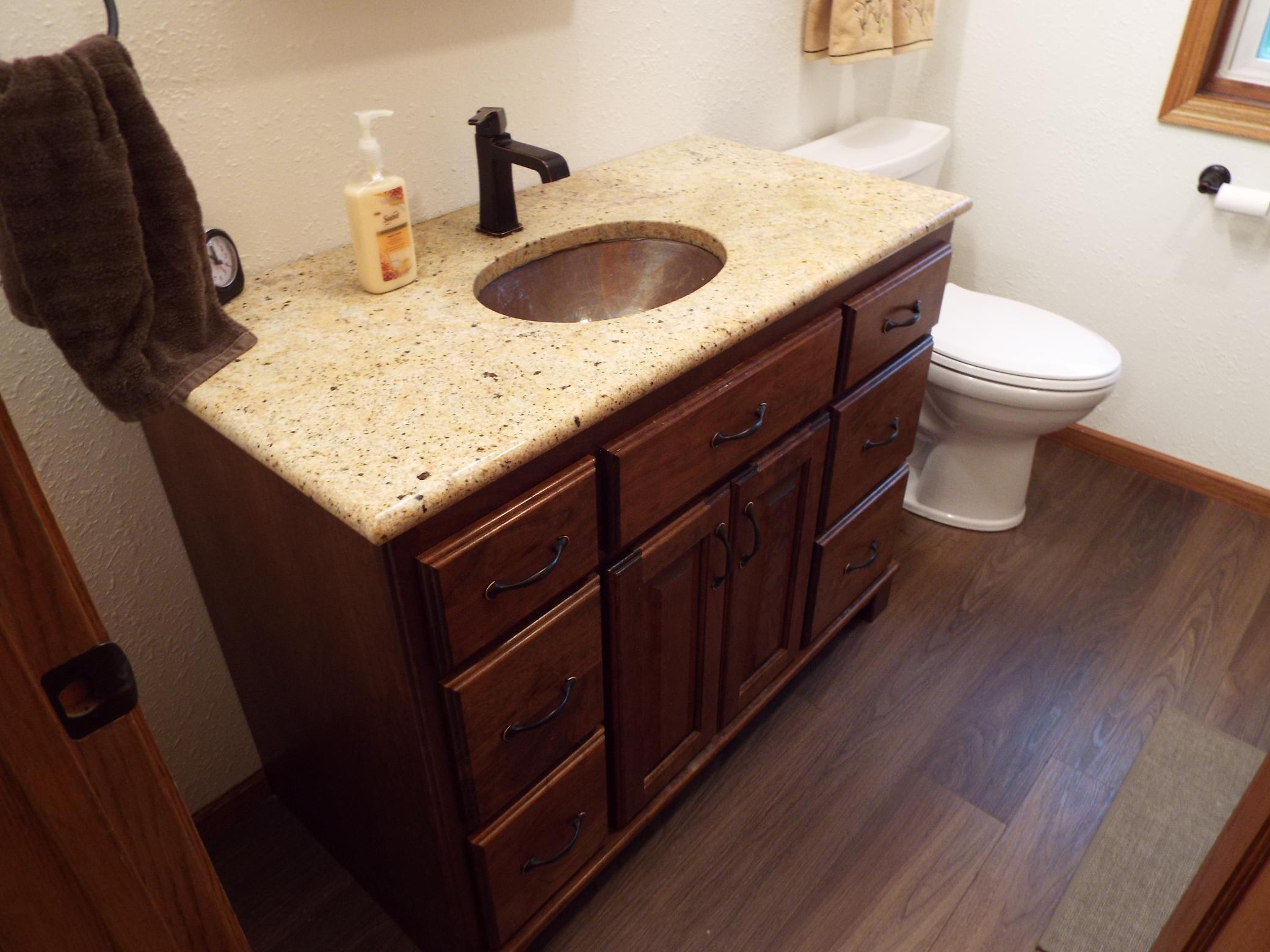 Guest Bath new vanity with granite top and copper sink