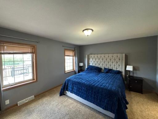 Primary Suite off dining room--opposite of other bedrooms