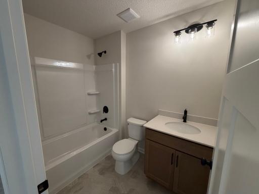 Also, on the top floor we have a shower/tub combo which is set up great for secondary use and for when the fur babies need a bath!