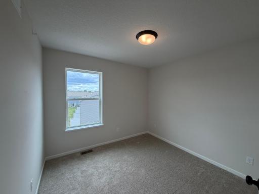 The secondary bedrooms are perfectly sized for everyone.