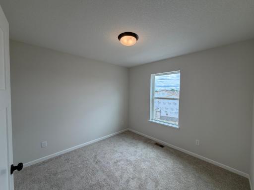 The secondary bedrooms are perfectly sized for everyone.