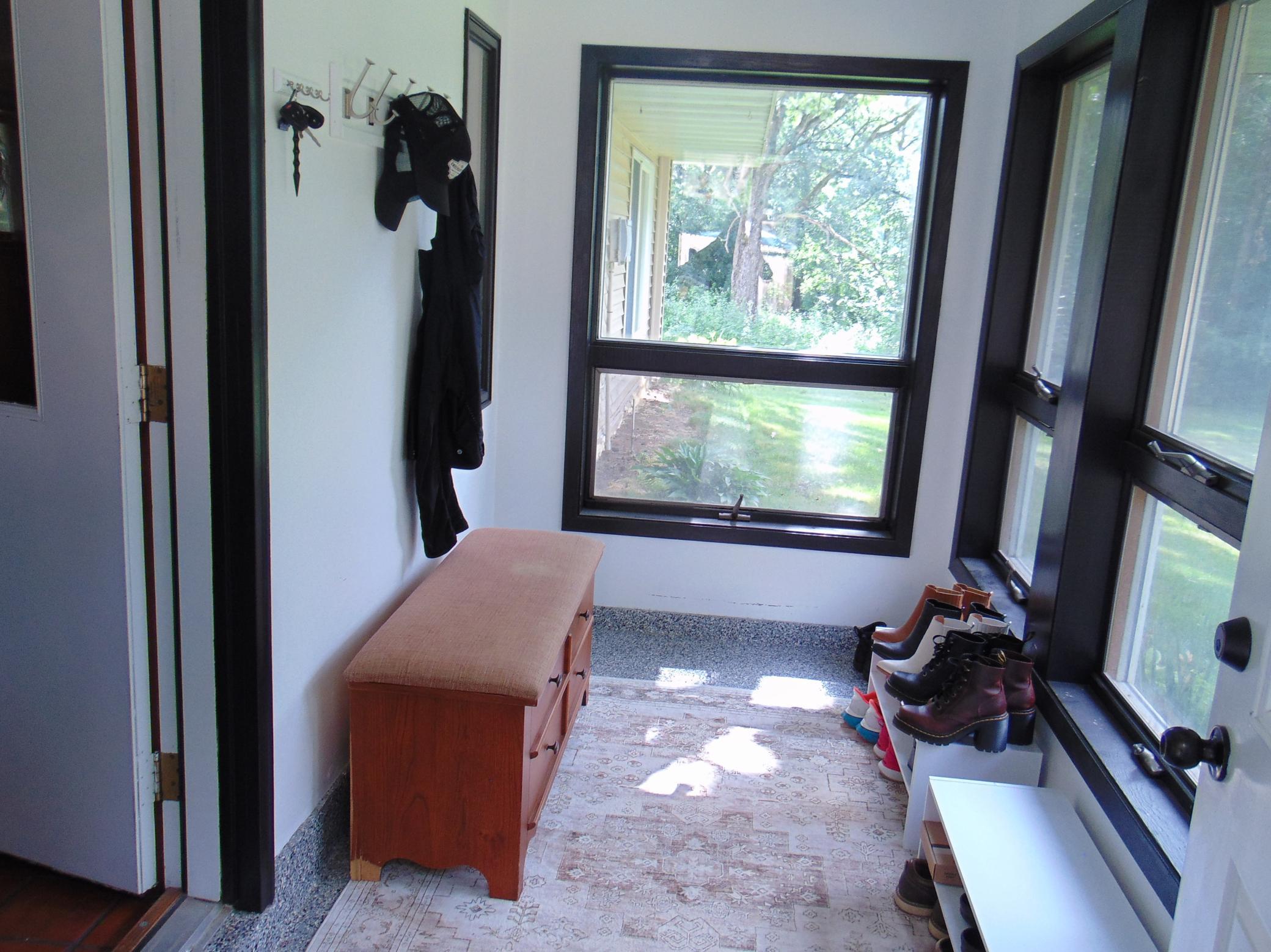 Enter through porch/sunroom.