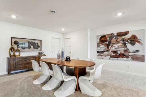 (Photo of a decorated model, actual homes finishes will vary) The recreation room.