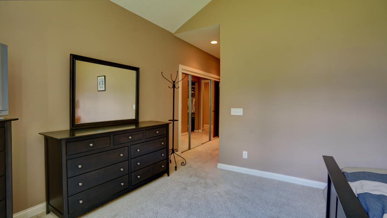 Storage is unmatched: the suite entryway features an 8-to-10-foot run of integrated wall closets for immediate organization.